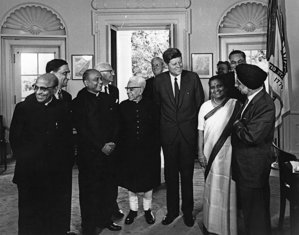 President John F. Kennedy in the Oval Office with members of an Indian parliamentary delegation